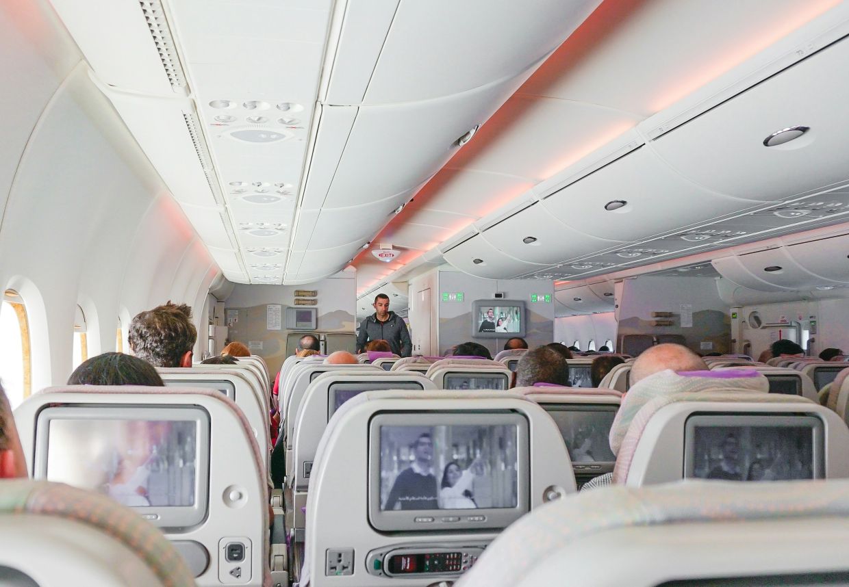 Watching movies is one of the preferred ways to pass the time on long flights. — Unsplash
