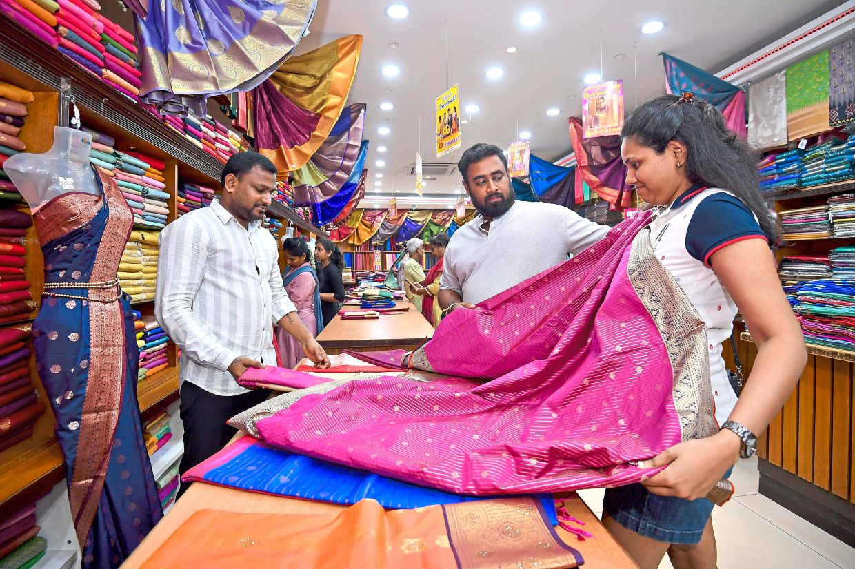 Shop for colourful textiles at Klang’s Little India. — IZZRAFIQ ALIAS/The Star