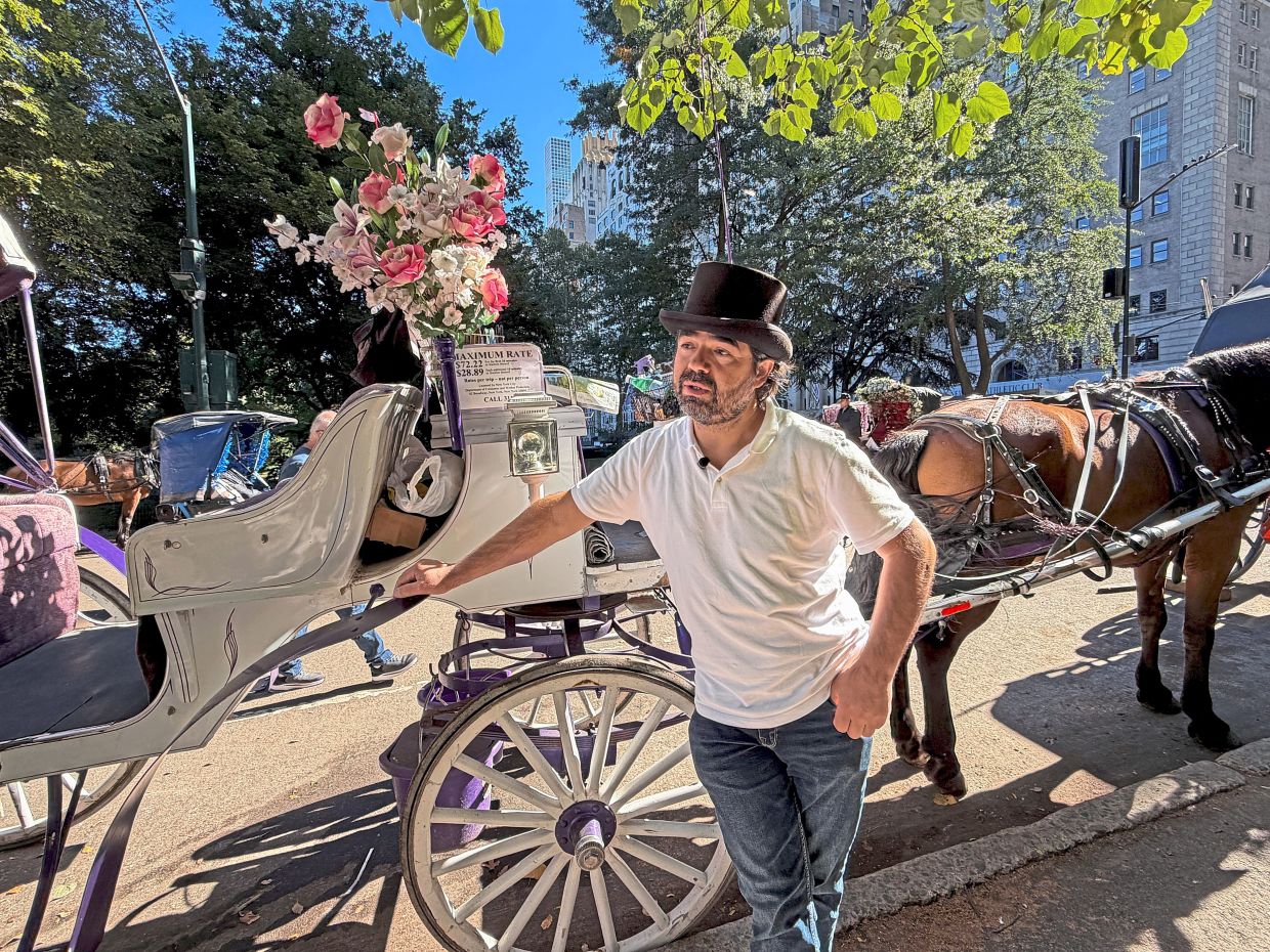 Ahmet with his horse, Sheila. The ban raises questions about the future of the owners’ horses, among others. — Reuters