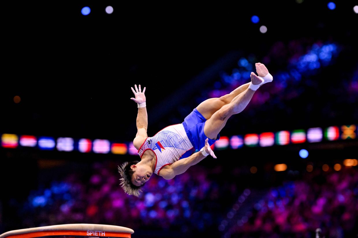 Philippines' Carlos Edriel Yulo competes in the Men's Vault Final during the 54th FIG Artistic Gymnastics World Championships in Rotterdam, the southern Netherlands. -- Photo by JOHN THYS / AFP