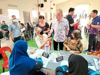 Cash aid for seniors under Johor scheme