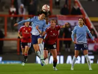 Soccer-Terland strikes late to give Man United derby draw with City in WSL