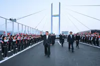 North Korea’s Kim crosses new bridge into China