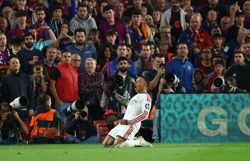Soccer-Real Madrid defeat Barcelona at Camp Nou to halve gap to LaLiga leaders