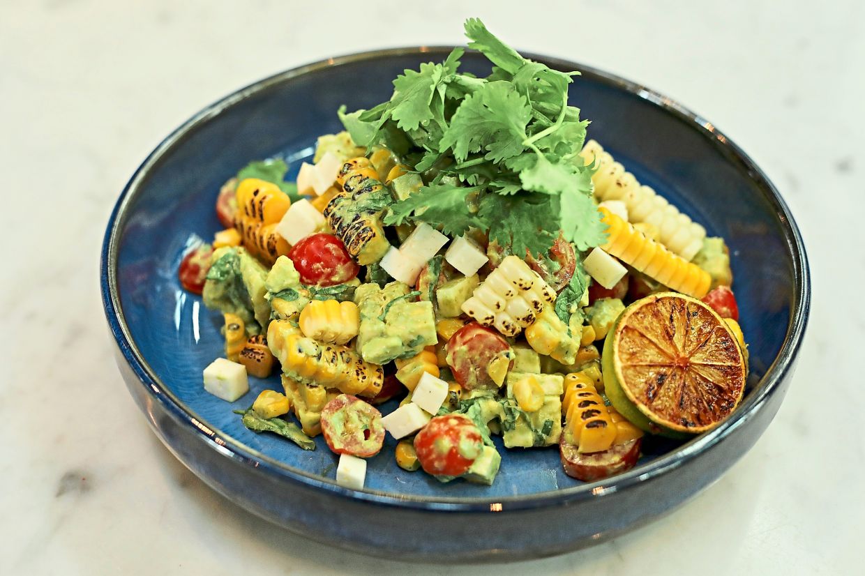 This livewire of a dish harnesses the strengths of each ingredient here, like the charred corn, avocado, tomatoes and grilled halloumi.