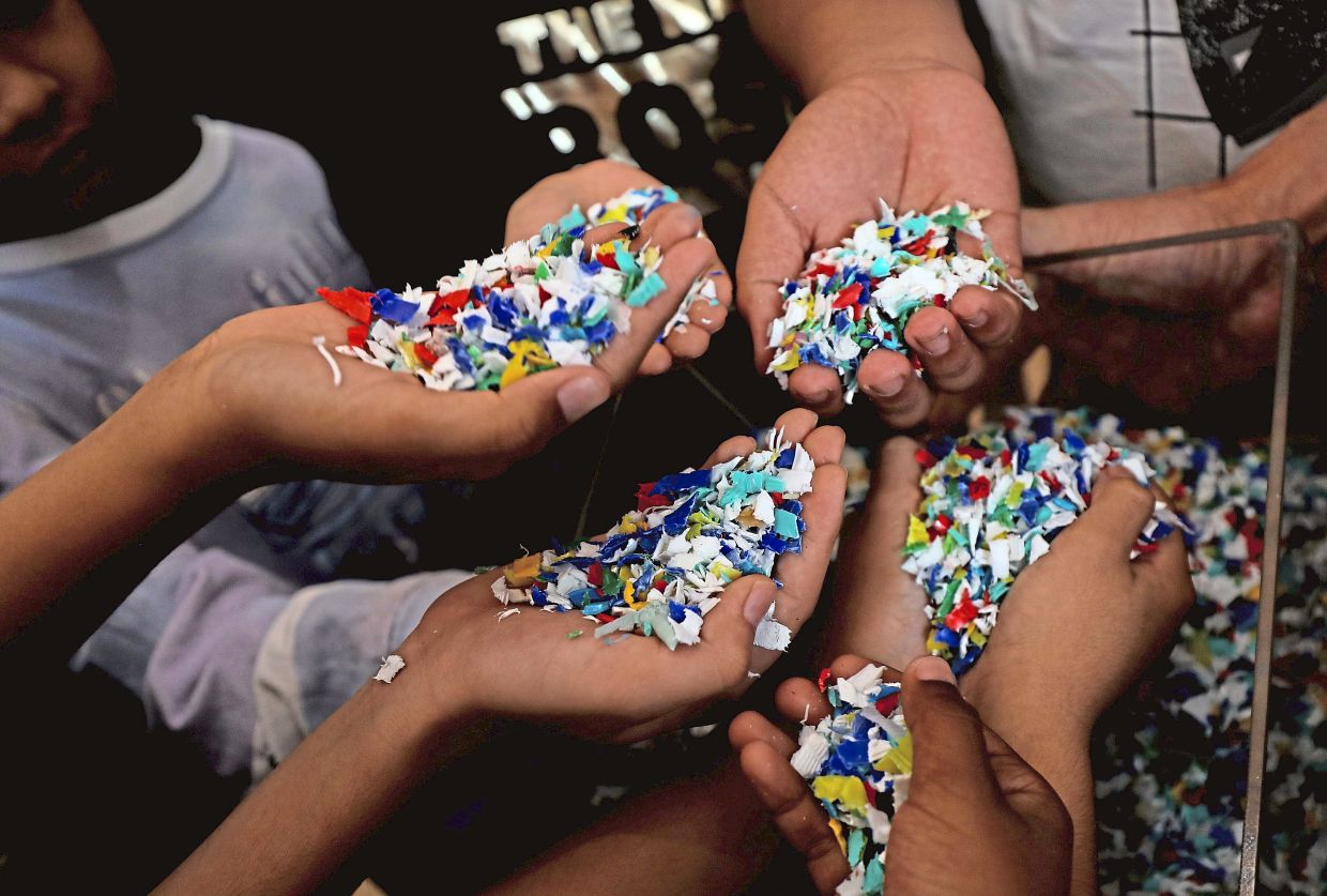 Plastic remnants processed from discarded Samsonite luggage can be repurposed through upcycling. Photo: The Star/Azlina Abdullah