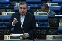 Too few workshops for fitting speed limiters among reasons enforcement was put off, says Loke