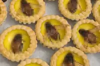 China eatery creates egg tarts topped with ‘giant cockroaches’, drawing widespread curiosity