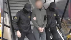 Japan says officials met detained reporter in Russia