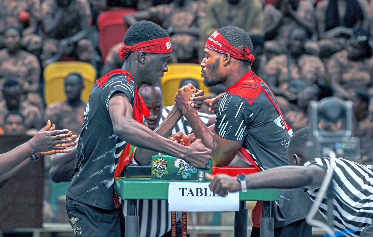 Athletes compete during the 15th Africa Armwrestling Federation Championship in Accra, Ghana.