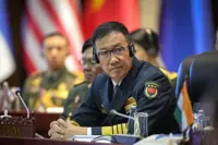China downgrades envoy to Asean meeting after sea row
