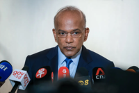 Leaders of firms probed for haze links called for meeting with Singapore ministers, warned to cooperate