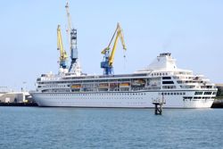 A US cruise ship ends a global voyage in Cambodia due to fuel costs and 200 passengers lose their homes