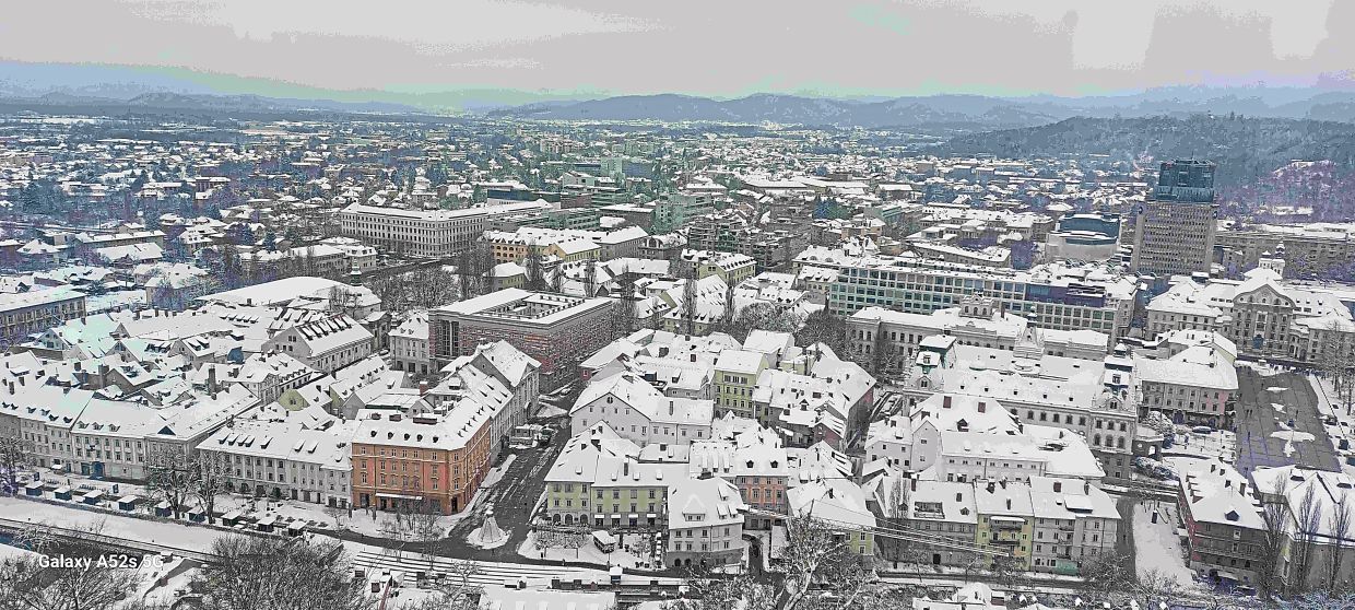 A view of the city covered in snow from Ljubljana Castle.