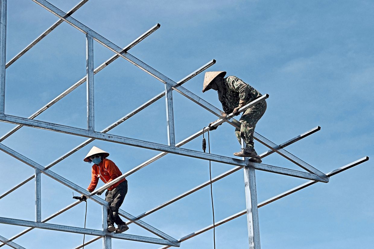 Firms urge tax overhaul to boost competitiveness