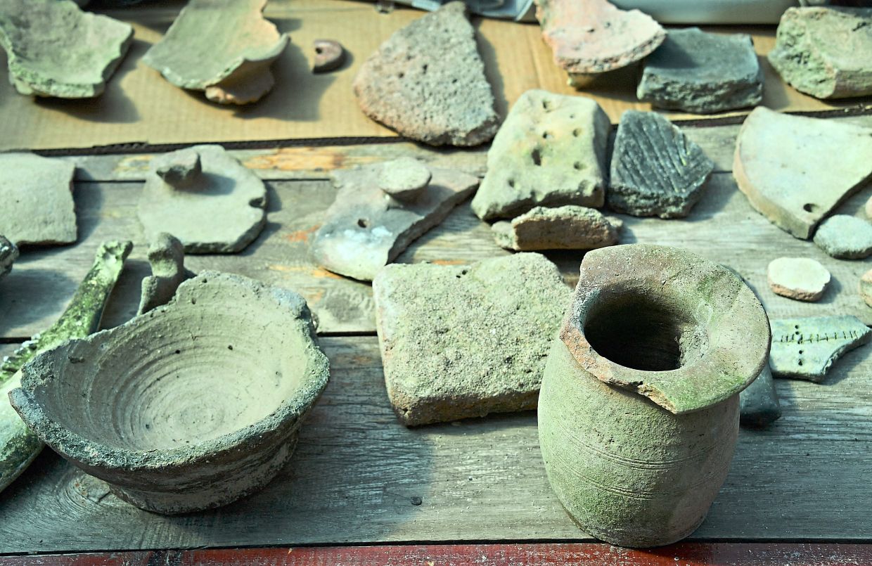 Artefacts discovered by the expedition members at the underwater site on the bed of Lake Issyk-Kul. — AFP