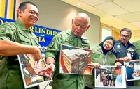 Couple carrying nearly RM3mil in cash nabbed