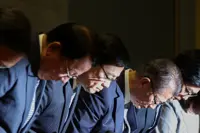 Hong Kong leader apologises for deadly fire