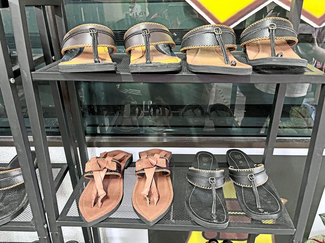 Variety of sandal designed and made by Saad Saep.
