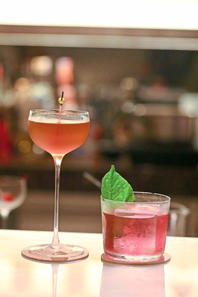 Balam (left) is a more spirit forwards drink while K'iik blends mezcal, orange liqueur, chimichurri, beetroot, yellow bell pepper, chamomile and pink peppercorn.