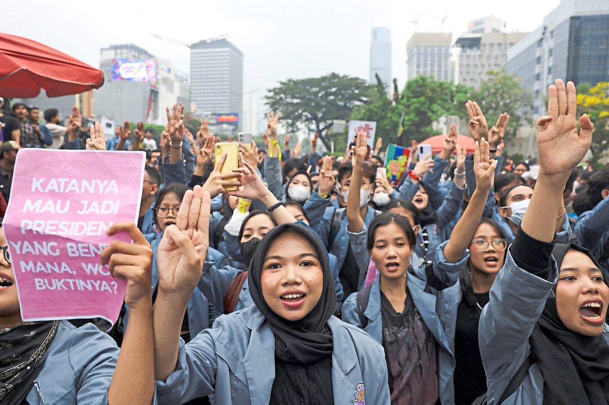 university students taking part in a protest against Prabowo’s policies and the government’s handling of wildfires, in Jakarta. — AFP/AP/Reuters
