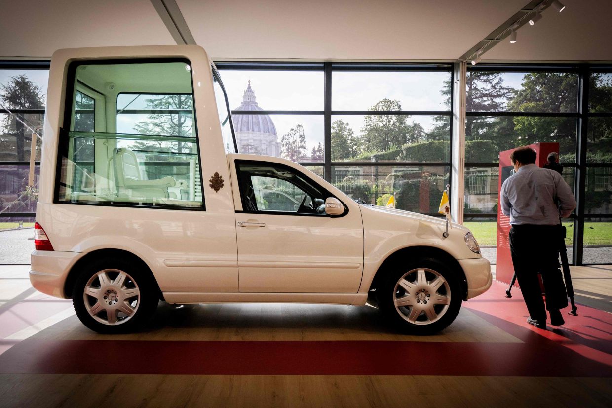 The exhibition presents eight historic vehicles mapping 100 years of papal mobility. Photo: AFP