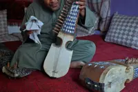 In Afghanistan, musicians defy music ban to keep traditions alive