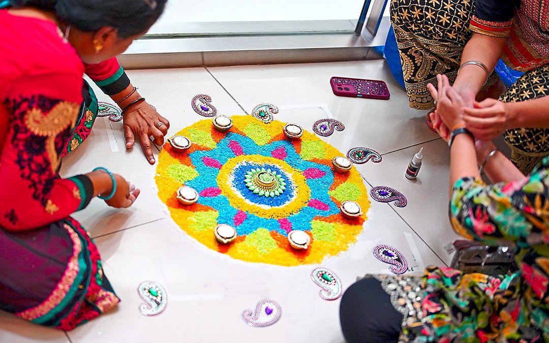 Paradigm Mall features 46 unique kolam displays crafted by 77 participants. — Handout