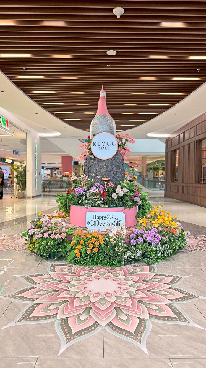 A pink peacock surrounded by pastel flowers forms the centrepiece of KLGCC Mall’s display. — Handout