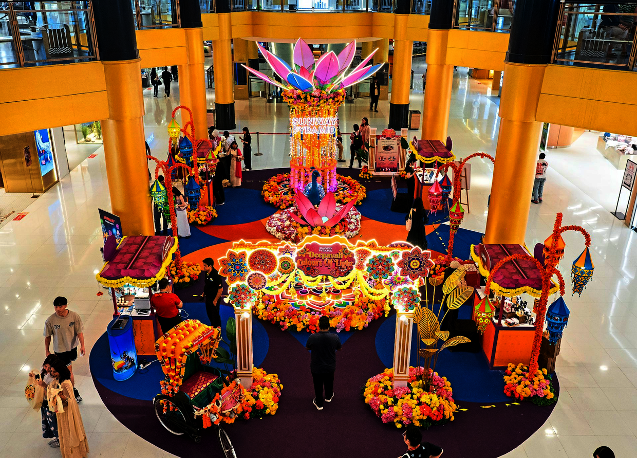 A peacock rises from the centre of a two-tiered kolam at Sunway Pyramid’s Grand Foyer. — Handout