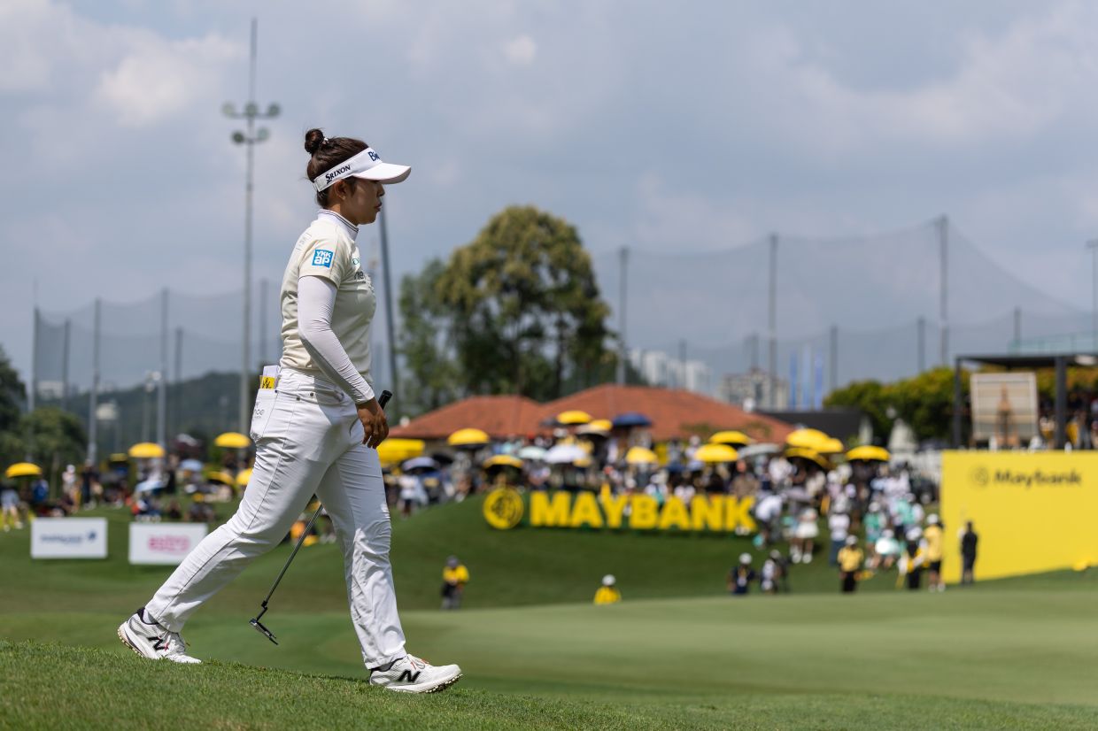 Championship leader Miyu Yamashita of Japan walks across the green during the third round of the LPGA Tour Maybank Championship 2026 at the Kuala Lumpur Golf & Country Club on Saturday (Oct 31). -- Photo: Bernama