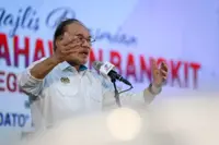 Anwar calls for stronger action against school bullying